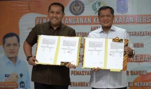  Bupati H M Syukur dengan Kanwil Ditjenpas Jambi Teken MoU